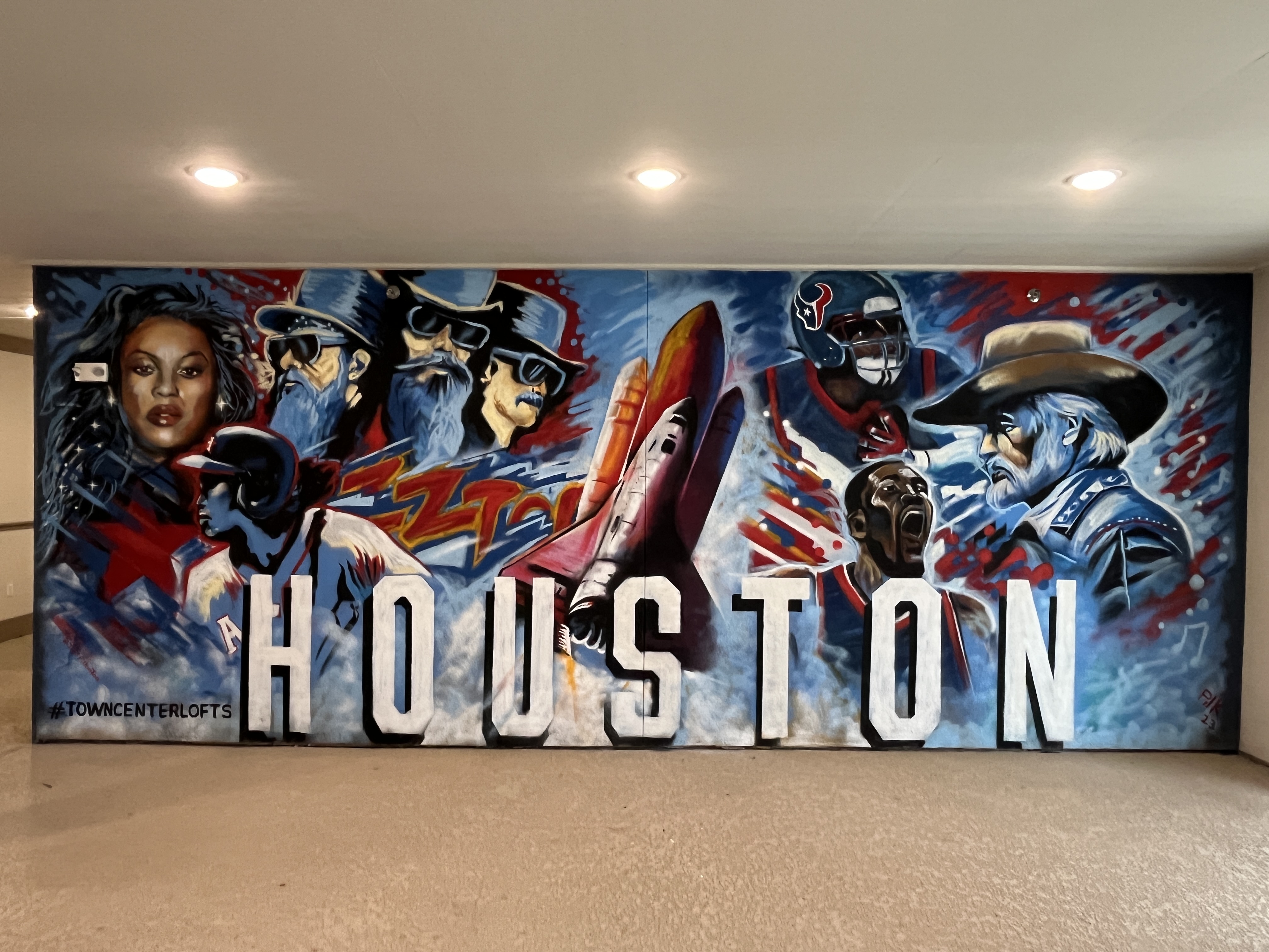 Houston Texas cultural mural with Rockets astronaut and cowboy themes